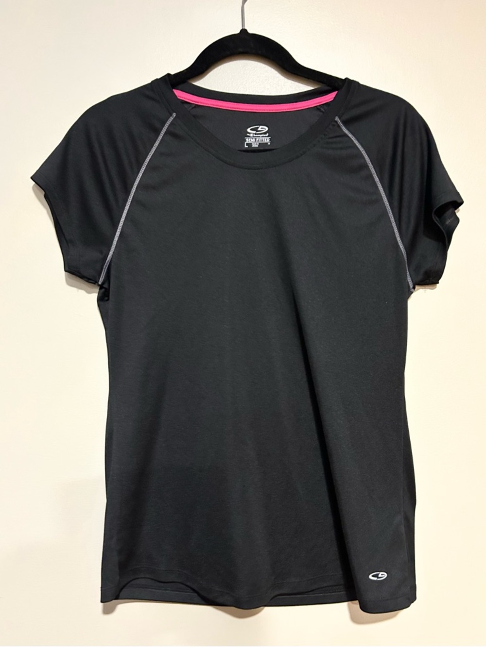 Champion Black Tee with Pink Neck Trim. Size L